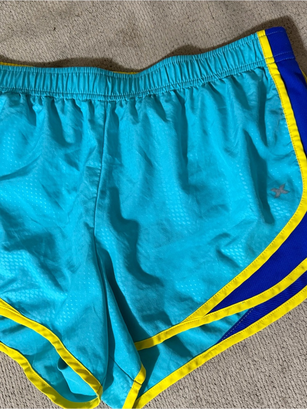 Xersion women’s lg Teal athletic Shorts with Yellow accents .breathable.